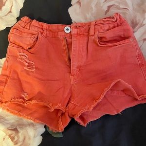 red jean shorts